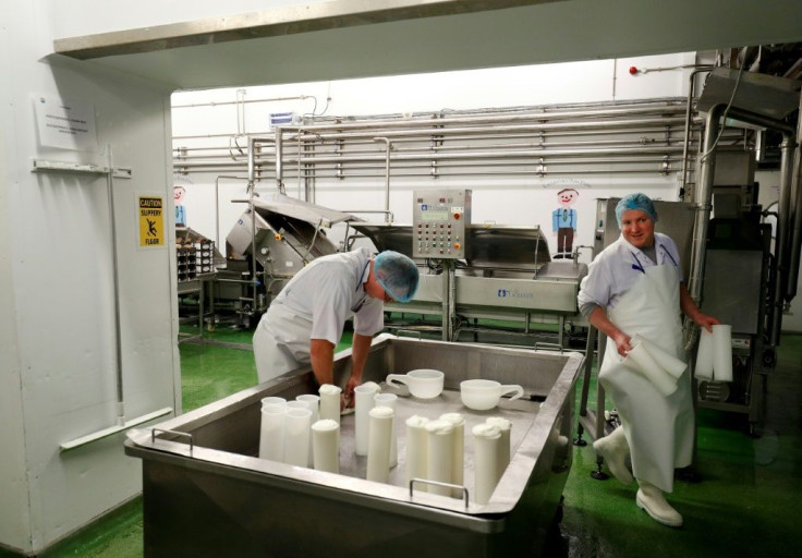 About 300 dairy farmers (cheesemaking at a dairy in Hampshire pictured February 2019), together producing around one million litres of milk daily, could be eligible for federal reimbursement