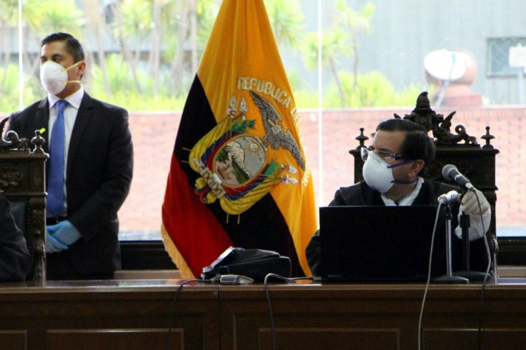 Ecuadoran Judge Ivan Leon (R) during the hearing at the National Court in Quito against exiled former President Rafael Correa, who accuses the country's judges of complicity in political persecution