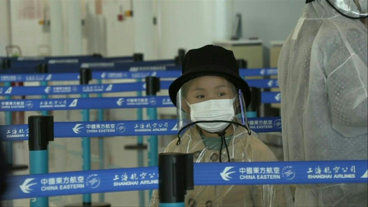 IMAGESPassengers arrive and check in for flights at Wuhan Tianhe Airport as China lifts a travel ban on residents of the central city, where the coronavirus pandemic began last year.