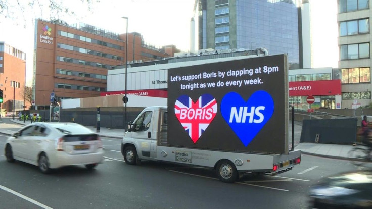 IMAGES A truck stationed outside London's St Thomas' Hospital displays messages of support for British Prime Minister Boris Johnson. Messages on its LED screen call on people to clap for him as he battles to make a recovery from  COVID-19.