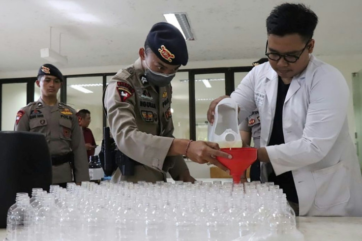 Staff at a Bali university have turned 4,000 litres of local palm wine into a hand sanitiser to protect residents of the holiday island against the coronavirus
