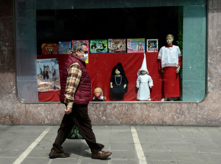 With processions called off, many religious brotherhoods in Spain have focused on helping fight the coronavirus pandemic that has claimed more than 14,500 lives in the country