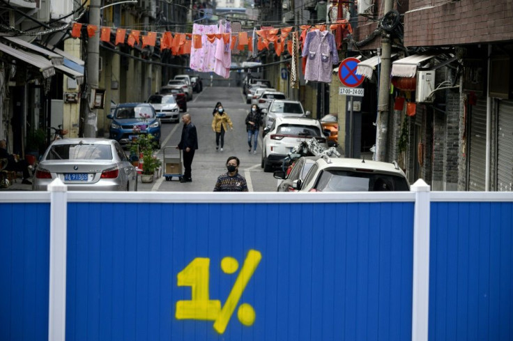 Some residential areas in Wuhan are still barricaded off to outsiders