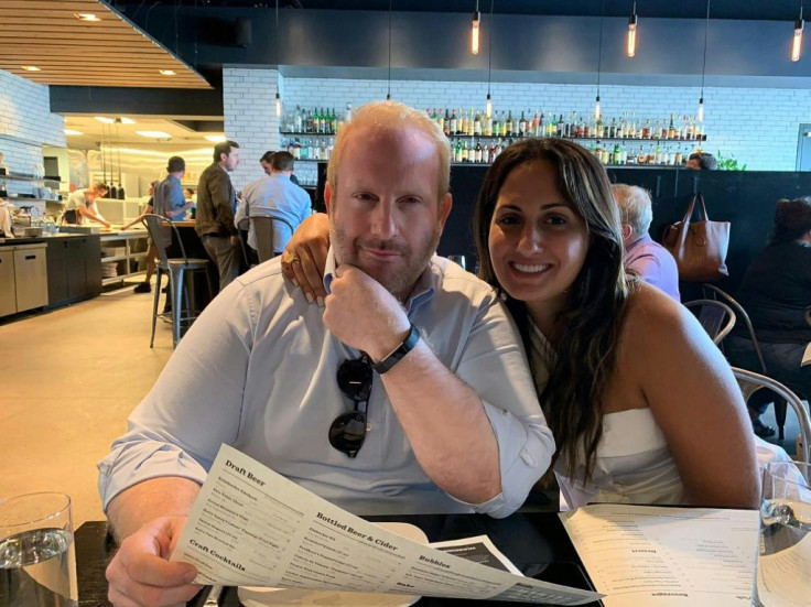 This handout picture courtesy of Rachelle Eid shows Samy Eid, owner of three top restaurants in Michighan, and his fiance Francesca George on August 6, 2019 in a restaurant in Detroit.