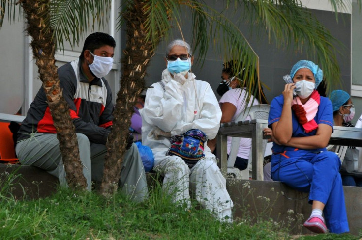Relatives of patients outside Los Ceibos on April 8. The hospital is now dedicated to coronavirus patients