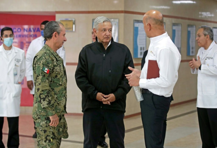 Mexico President Andres Manuel Lopez Obrador (center) has come under fire for his handling of the coronavirus outbreak due to his reluctance to take measures that would hurt the country's economy