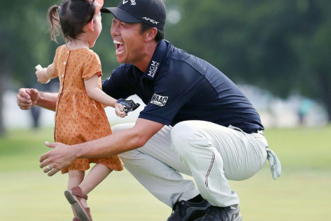 American Kevin Na celebrates with his daughter, Sophia, after winning the 2019 Charles Schwab Challenge at Colonial Country Club. The tournament could be the first event if the US PGA Tour resumes play in 2020 in the wake of the coronavirus pandemic