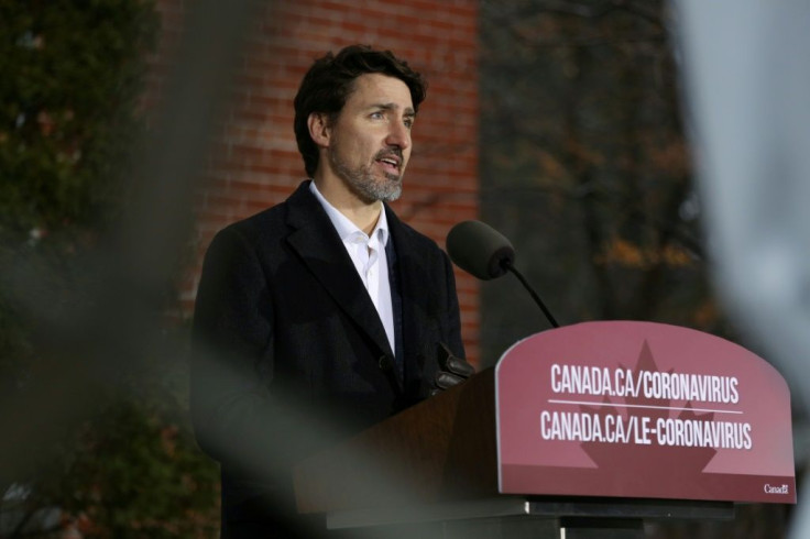 Canadian Prime Minister Justin Trudeau, shown here on March 29, 2020, said the virus fight is no less "destructive" than war