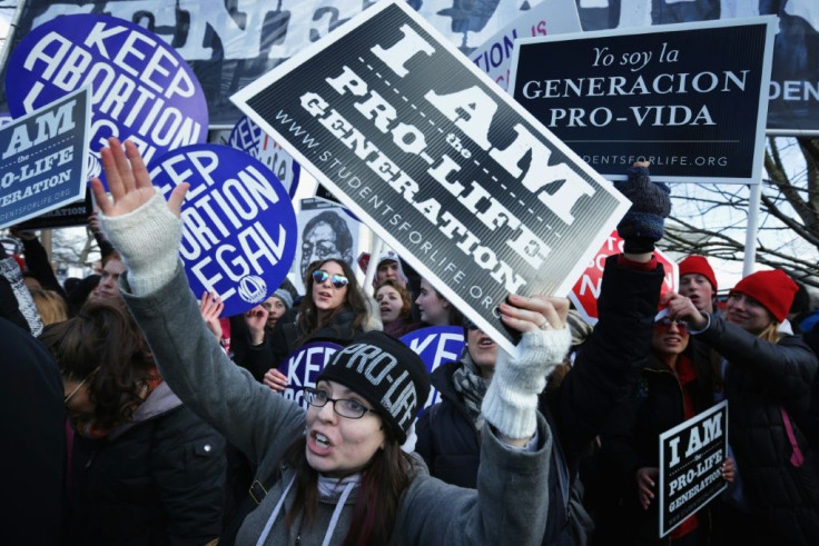 Anti-abortion activists try to disrupt a march by abortion rights activists in Washington on January 22, 2019