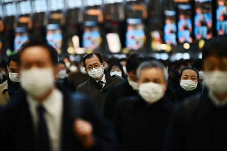 The number of commuters in Tokyo's notoriously overcrowded transport system has dropped significantly, but some office workers can't work remotely