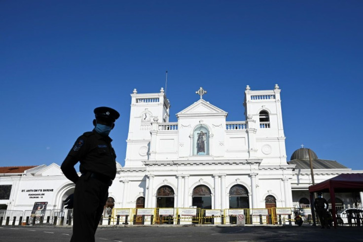 A policeman stands guard outside St. Anthony's church, which was hit by the 2019 Easter suicide bombers