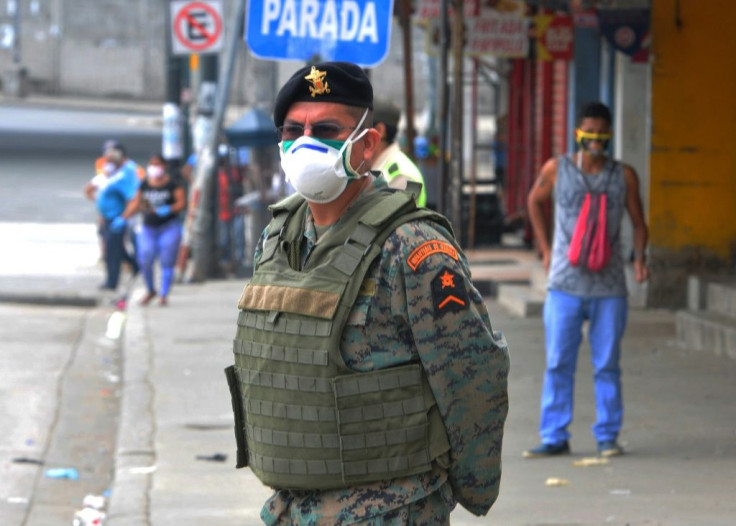 A soldier patrols in Guyaquil, a city which resisted the socialism of ex-president Rafael Correale