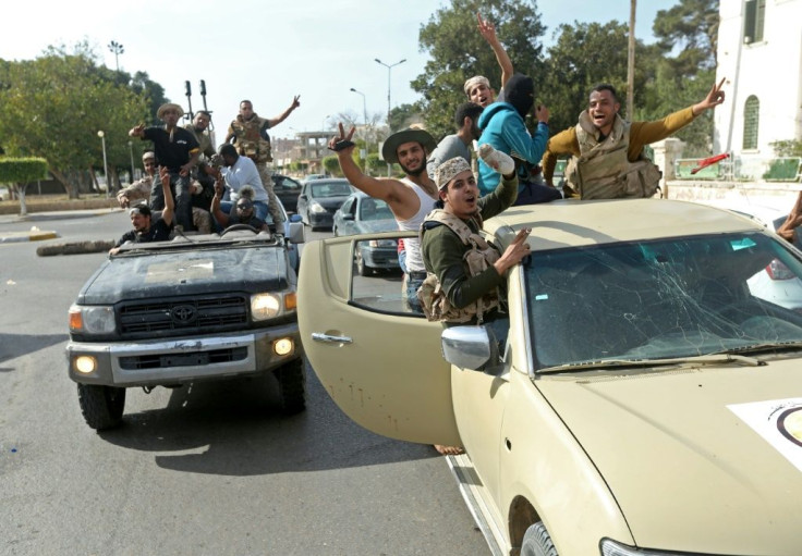 Pro-GNA fighters celebrate in Sabratha after retaking the city on Monday