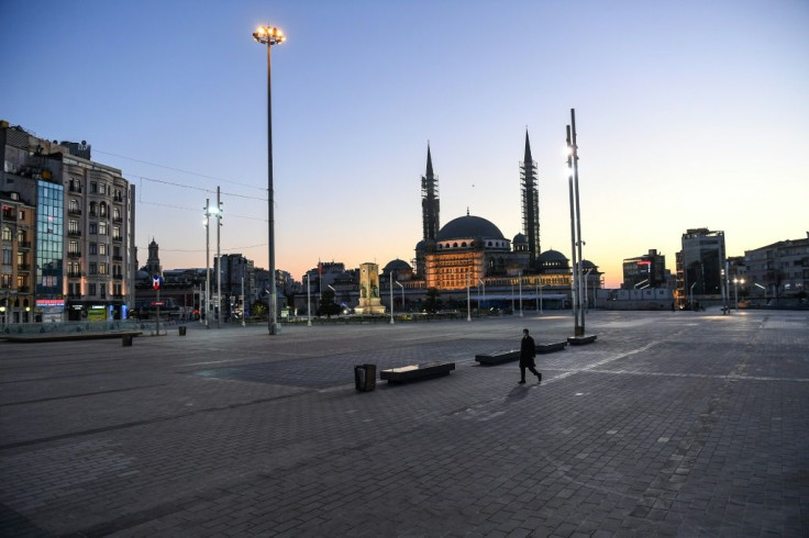 Istanbul's Taksim Square is deserted on April 12, 2020, during a two-day curfew to prevent the spread of COVID-19 -- Turkey's parliament approved a law that allows tens of thousands of prisoners to be freed as another safety measure
