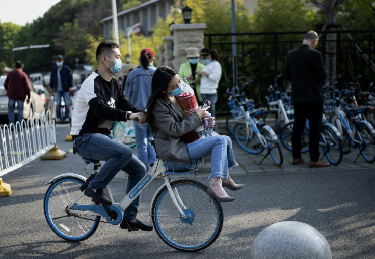 People in Wuhan are being asked to go through multiple procedures to travel to Beijing