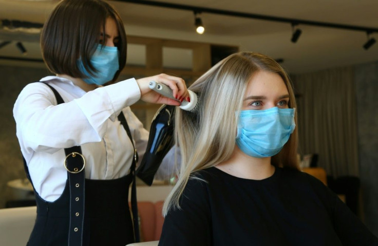 Russian small businesses such as this Vladivostok hairdresser have been struggling under coronavirus restrictions