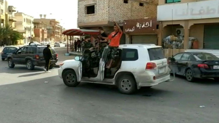 IMAGESFighters supporting Libya's unity government celebrate at a roundabout in Sabratha after seizing the coastal city between Tripoli and the Tunisian border from troops backing military commander Khalifa Haftar, according to officials.
