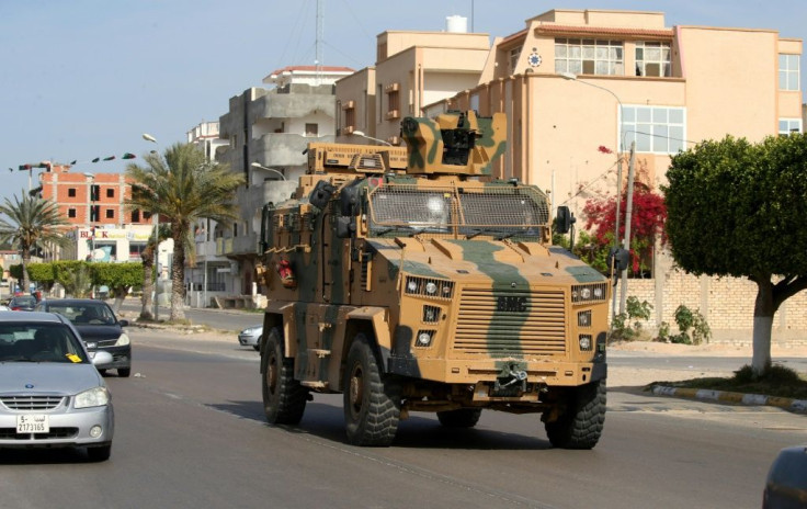 A Turkish-made armoured personnel vehicle drives through the Libyan coastal city of Sorman Monday after the unity government seized it from troops backing military commander Khalifa Haftar