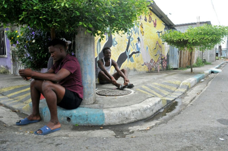 Social distancing is an afterthought in Guayaquil, Ecaudor's Nigeria neighborhood, where hunger and joblessness are more pressing fears