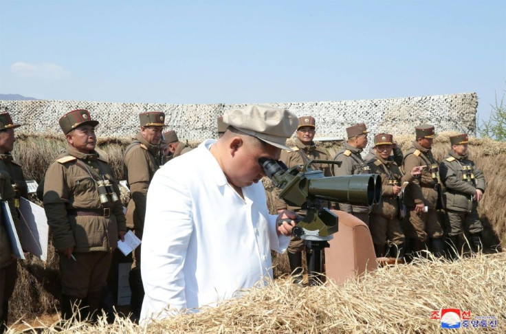 The weapons test came a day before North Korea marks the 108th anniversary of the birth of founder Kim Il Sung, grandfather of current leader Kim Jong Un, pictured inspecting a mortar unit drill