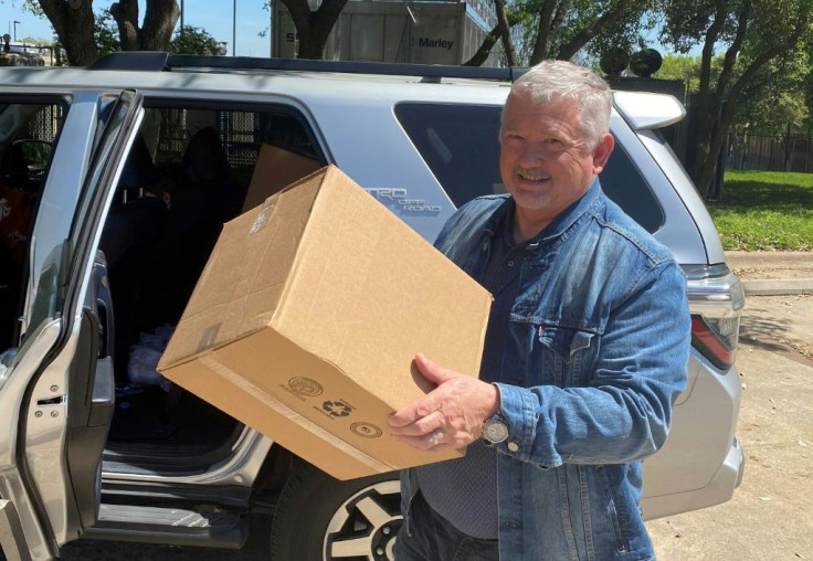 Val Stark, whose firm Catalyst Health Network provides supplies for medical practices across Texas, picks up masks in Austin for physicians in the Dallas-Fort Worth area in March 2020