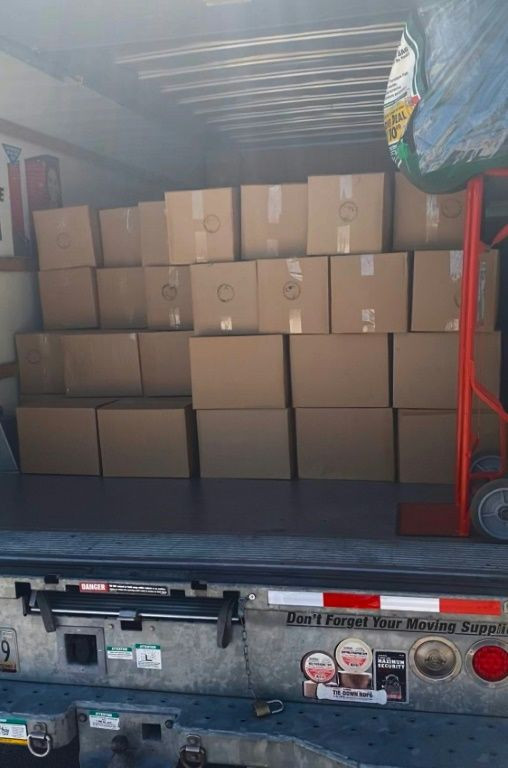 The boxes of masks from Mexico fill the back of a rental truck in Austin in March 2020