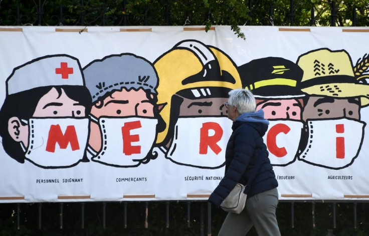 A poster in Paris thanks healthcare workers, shopkeepers, police, the post office staff and farmers