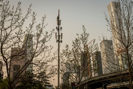 A cellphone tower (C), used for 5G network, is seen on a street in Beijing
