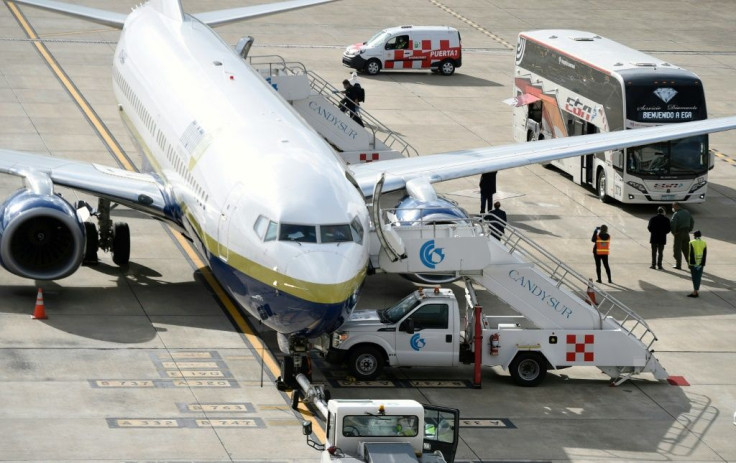 The final 15 passengers from the Greg Mortimer cruise ship, most of whom checked positive for the novel coronavirus, boarded a medical evacuation flight from Montevideo, Uruguay to Miami, Florida