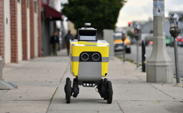 A Postmates delivery robot is seen on its route to deliver food to customers in Los Angeles on March 24