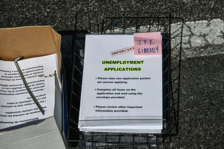 Unemployment forms at a drive-through collection point outside John F. Kennedy Library in Hialeah, Florida -- at least 17 million Americans have been pushed out of their jobs since mid-March, 2020 by the coronavirus pandemic