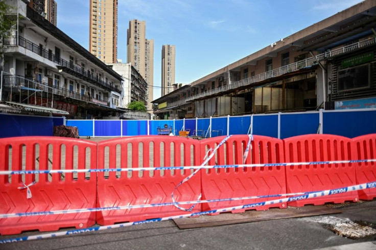 Where it all began: the Huanan Seafood Market, where the new coronavirus is believed to have emerged, remains closed