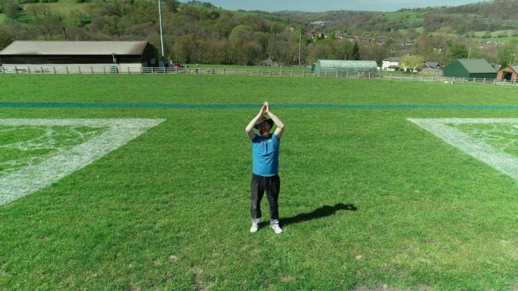 Artist Jamie Wardley, whose company Sand In Your Eye specialises in creating giant pieces of land art, participates in the latest clap for carers with a 100-metre-wide NHS logo painted on a field near his home in Mytholmroyd, West Yorkshire.