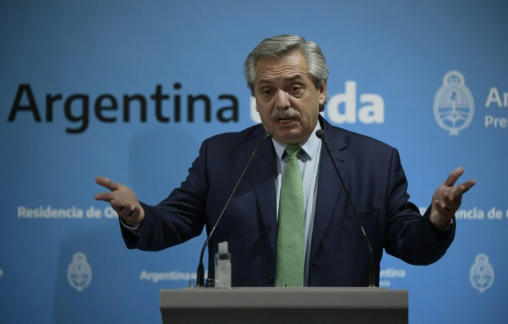 Argentina's President Alberto Fernandez, pictured in March 2020, has said his country is in "a sort of virtual default"