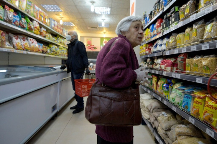 Armenians do their shopping at a supermarket in Yerevan amid the COVID-19 coronavirus pandemic.