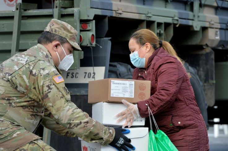 The National Guard delivers food to some communities hardest hit by the coronavirus pandemic in Chelsea, Massachusetts