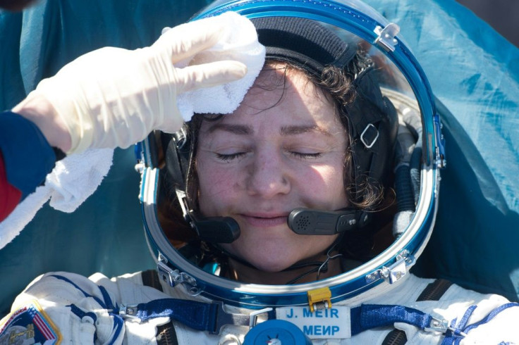 NASA astronaut Jessica Meir rests shortly after landing in  Kazakhstan