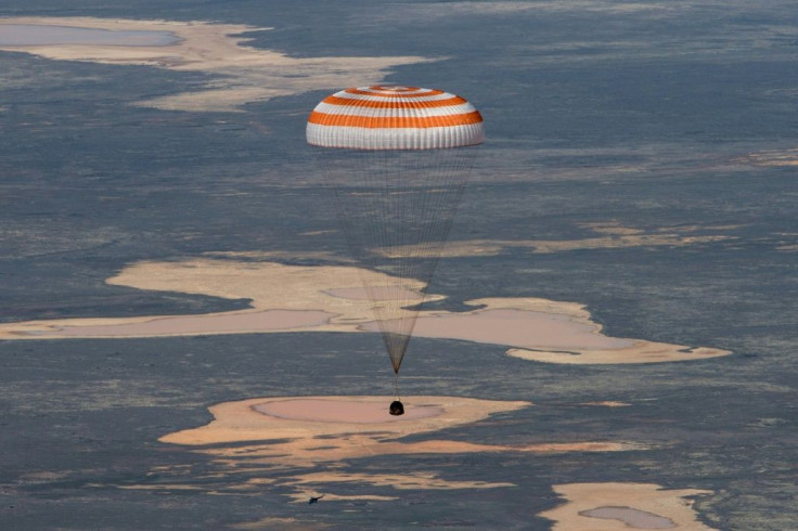 The Soyuz MS-15 capsule carrying the International Space Station descends beneath a parachute before landing in  Kazakhstan