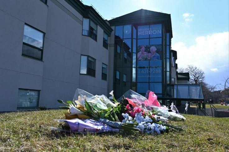 Flowers outside the Herron nursing home in the Montreal suburb of Dorval, where 31 deaths prompted an investigation for negligence after caregivers fled amid a coronavirus outbreak