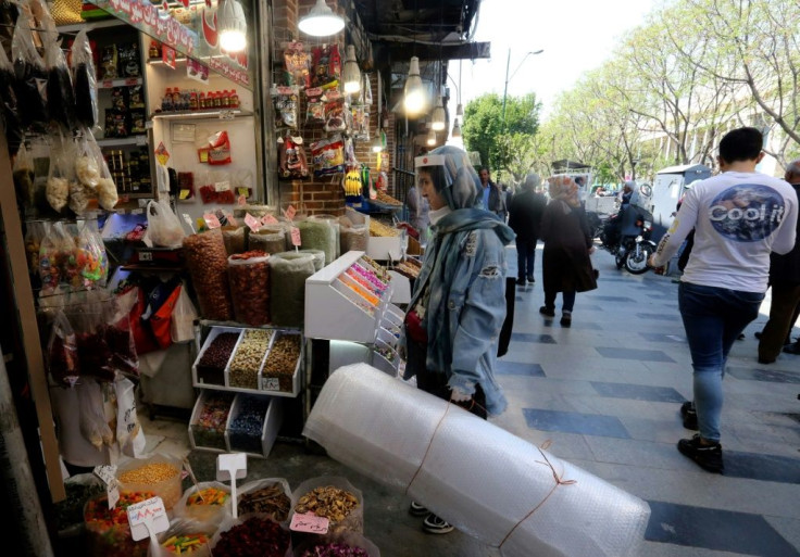 With an economy battered by US sanctions, many Iranians are reopening businesses despite the risks posed by the novel coronavirus