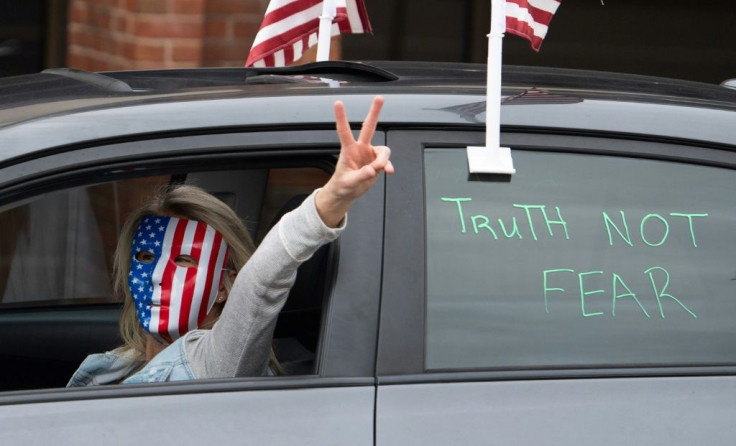 Protesters in Annapolis, Maryland call on the state to lift stay-at-home orders imposed over to the coronavirus pandemic, on April 18, 2020