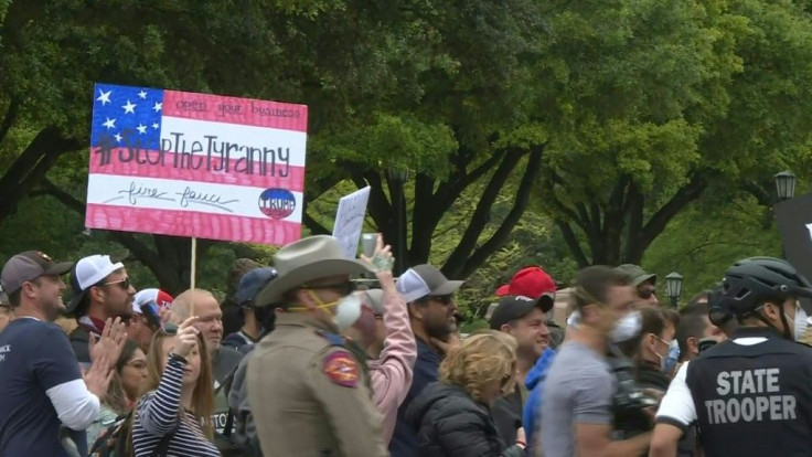 Protesters gather outside the Texas State Capitol in Austin to voice opposition to stay-at-home orders and other measures aimed at slowing the coronavirus pandemic