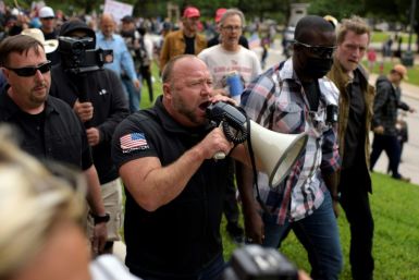 Far-right conspiracy theorist Alex Jones addresses a "Reopen America" rally at the State Capitol in Austin, Texas