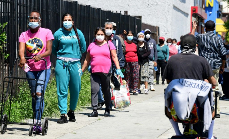 People line up at a food bank in Los Angeles