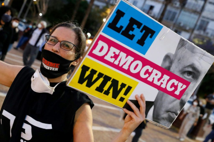 Many waved black flags as a symbol for threats against Israel's democracy