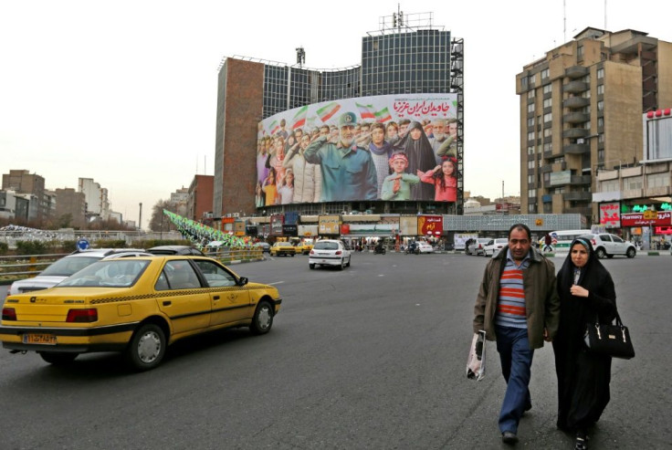 Hezbollah power-broker Muhammad Kawtharani is thought to have inherited some of the role held by Iranian Revolutionary Guard Corps head Qasem Soleimani (pictured on a billboard in Tehran) who was killed in a US drone strike in January