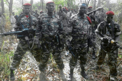 FDPC leader Abdoulaye Miskine(2R, pictured with his fighters in a photo released in 2013 by the FDPC) has been hit with UN sanctions which include an asset freeze and travel ban