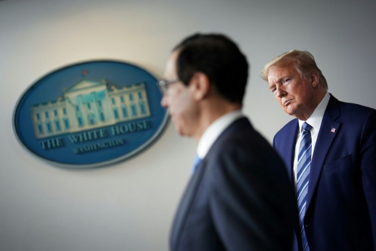 US Treasury Secretary Steven Mnuchin (L) said President Donald Trump's administration was giving "the benefit of the doubt" to companies and putting up clear guidance under which the money would be allocated