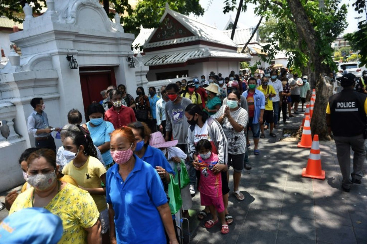 Hundreds stood in line for food donations in Bangkok's historic quarter