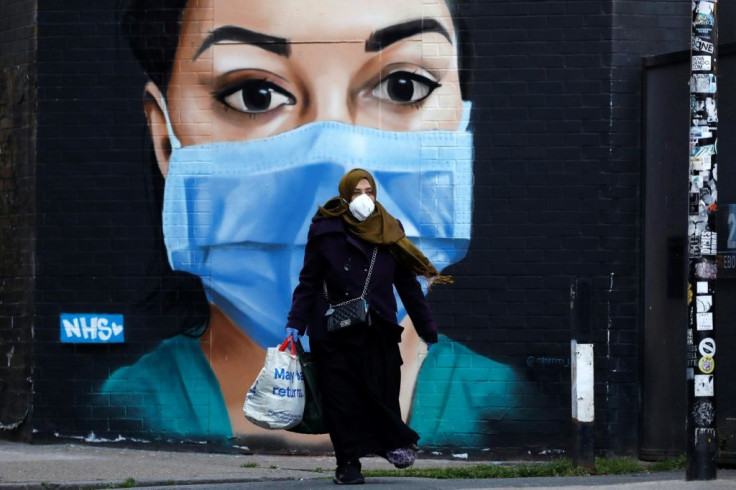 A mural in central London shows an NHS worker